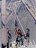 Remembering 9-11-firemen-raising-flag-wtc.jpg